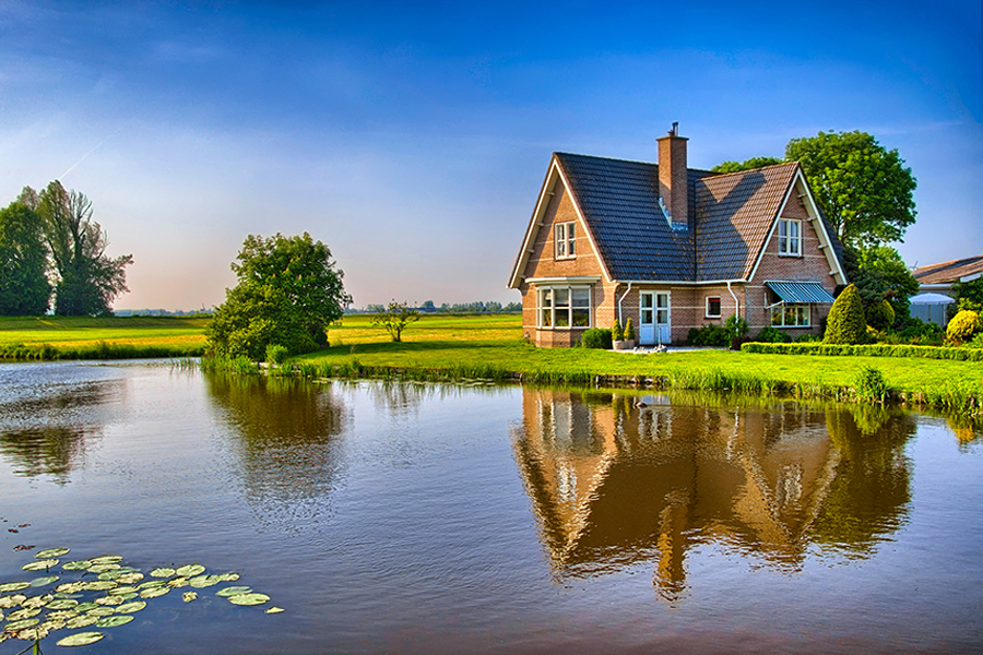 Country home beside a pond
